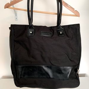 Calvin Klein Black Waterproof Shoulder Bag, can fold in for snap closure